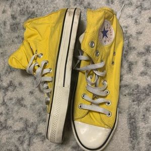 Yellow high top converse sneakers